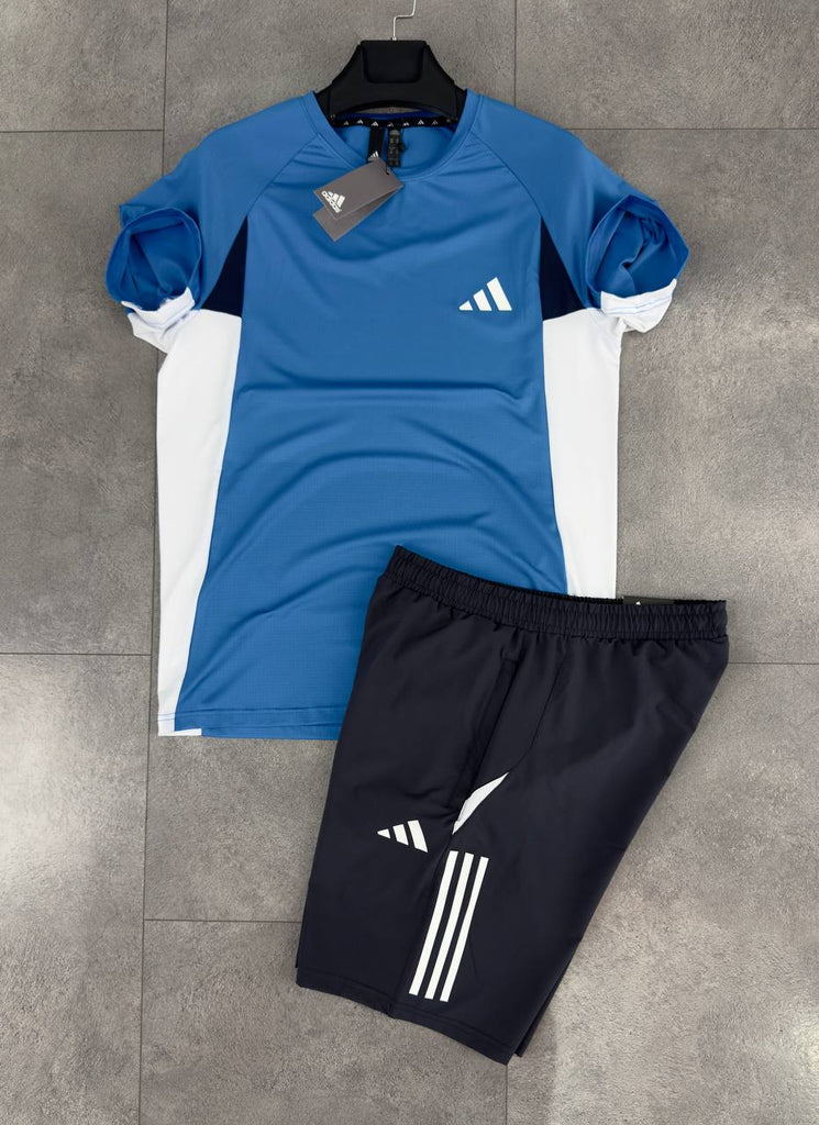 Pánska súprava Adidas, pozostáva z čiernych krátkych nohavíc a modré tričká. Vynikajúca kvalita.